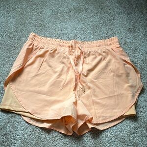 Buffbunny Lifesaver shorts in Peach Rings.